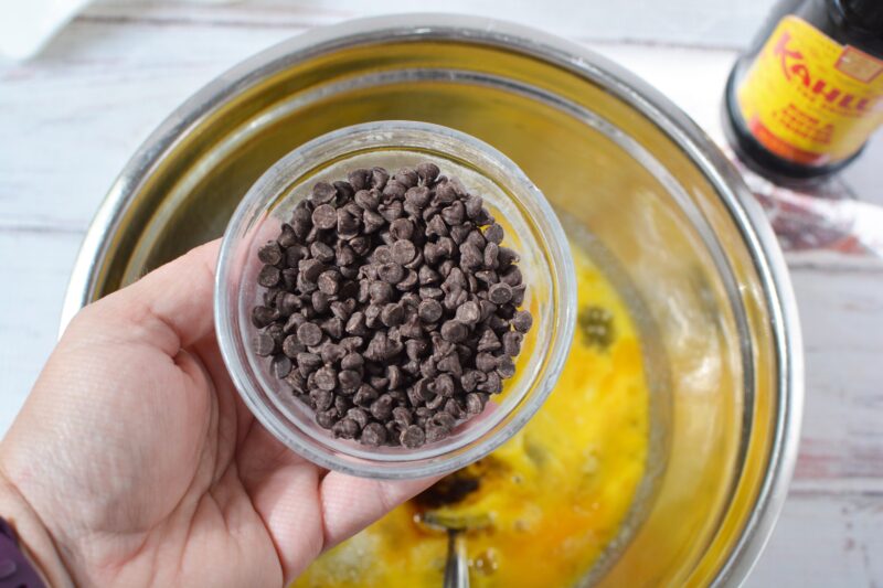 Adding the chocolate chips into the pie batter