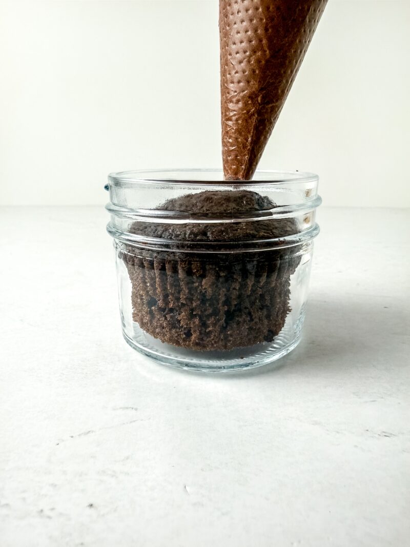 Frosting the cupcake