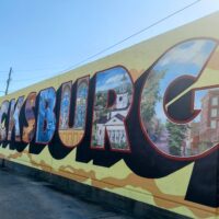 A Colorful mural of the word Vicksburg.