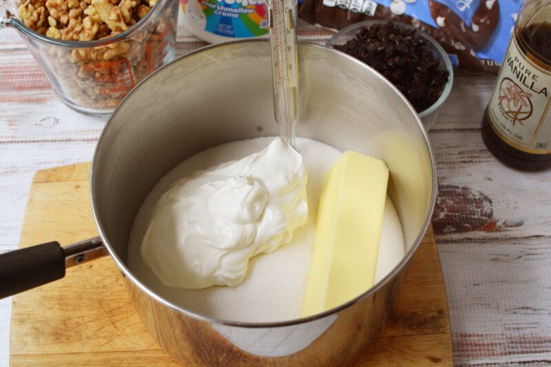 White Chocolate Cranberry Walnut Fudge Recipe Bringing everything to the soft ball stage in the saucepan.