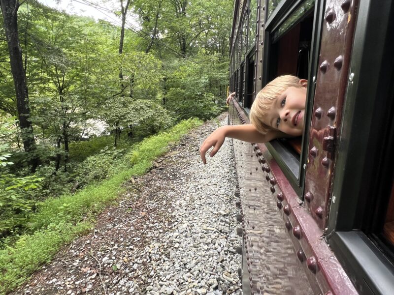 Child in train car at Great Smoky Mountains Railroad in Bryon City, NC