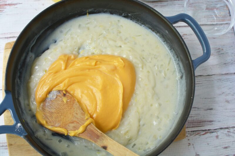 Onions and Butter in Frying Pan, Melted Butter and Onions, Making A Casserole Mixing the cheese whiz into the dish