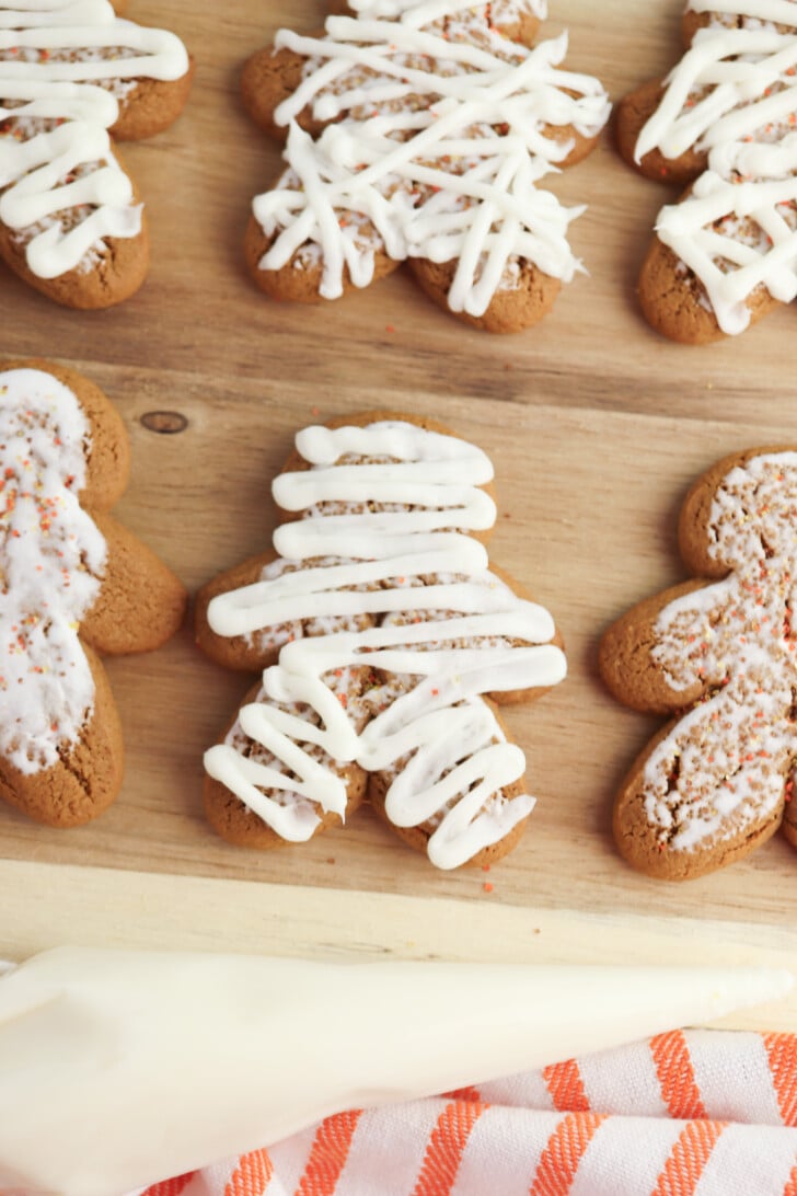Drawing the mummy bandages on the cookies