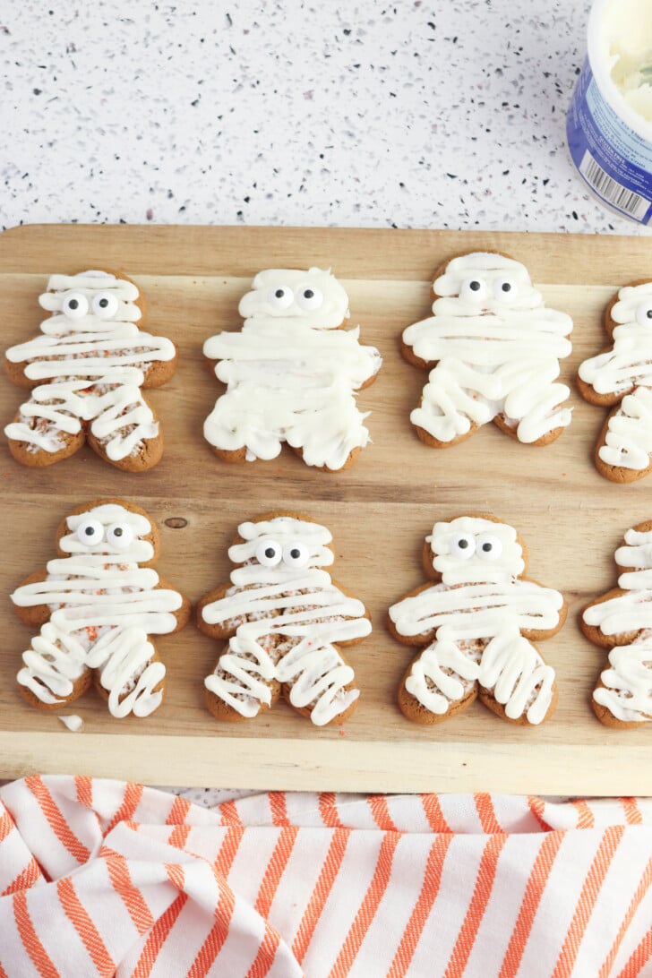 Adding the eyes to the Halloween Mummy Cookies